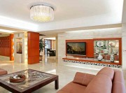 時(shí)尚新古典風(fēng)格100平米公寓客廳電視背景墻裝修效果圖 時(shí)尚新古典風(fēng)格100平米公寓客廳電視背景墻裝修效果圖