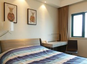 愜意舒適中式風格120平米三居室臥室背景墻裝修效果圖