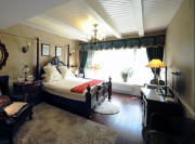 隨性別致美式風格110平米三居室臥室吊頂裝修效果圖